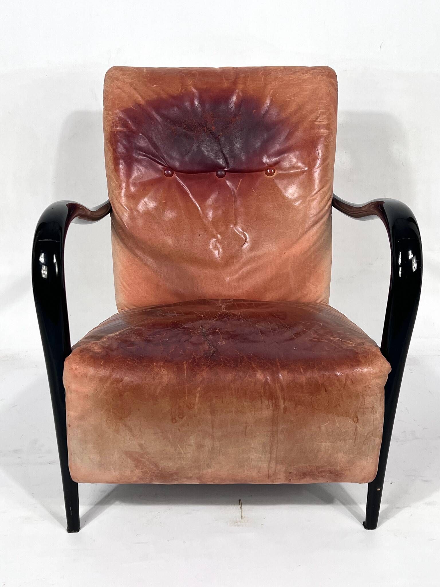 Sculptural Italian Mid-century leather and curved wood armchair from 50s