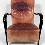 Sculptural Italian Mid-century leather and curved wood armchair from 50s