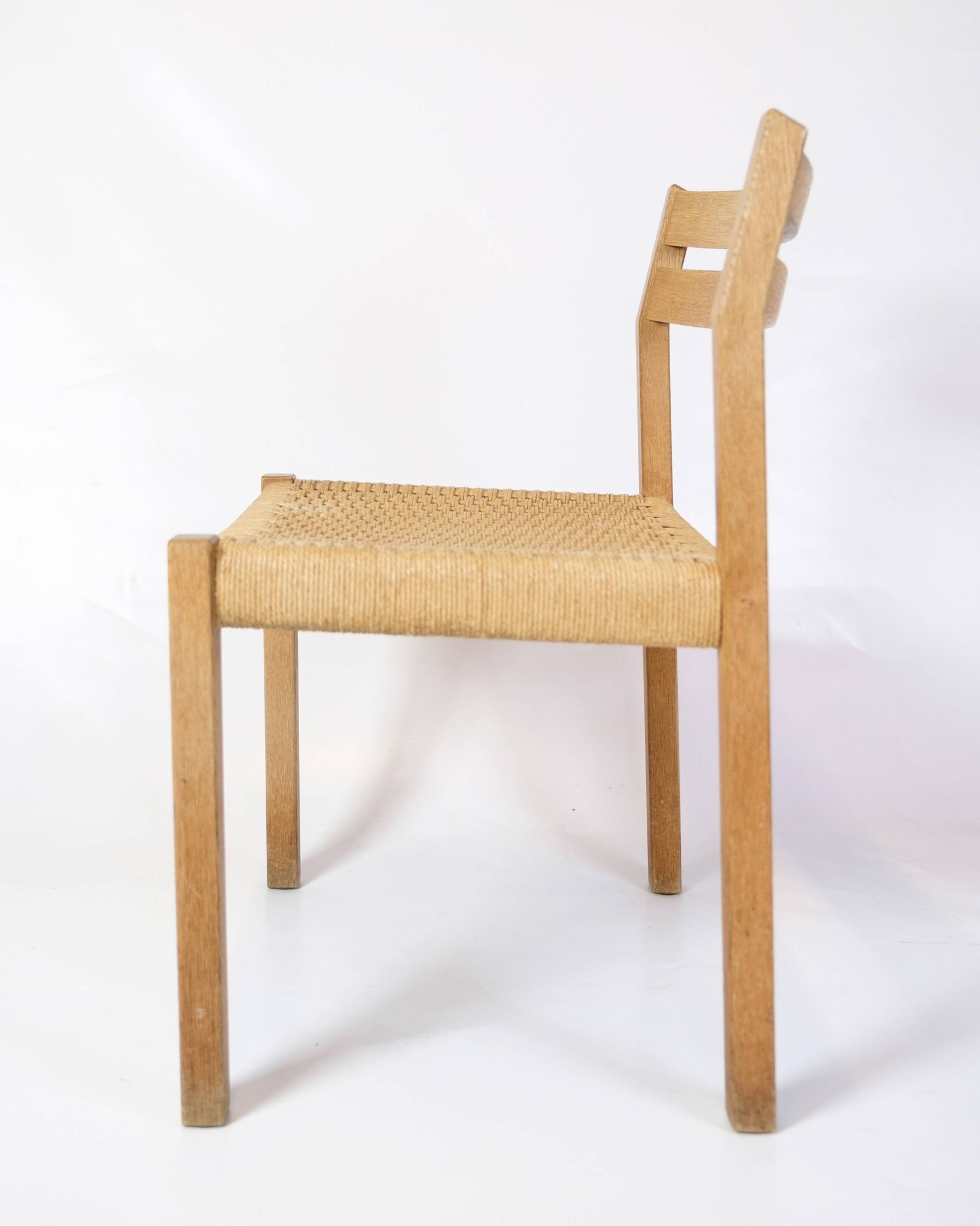 Ensemble de cinq chaises de salle à manger modèle 401 en chêne par Jørgen H. Møller