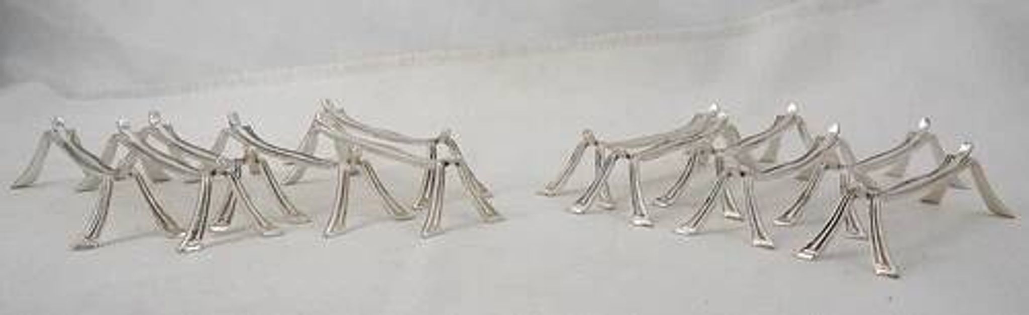 Christofle Printania model, Art Nouveau, 12 silver-plated knife rests.