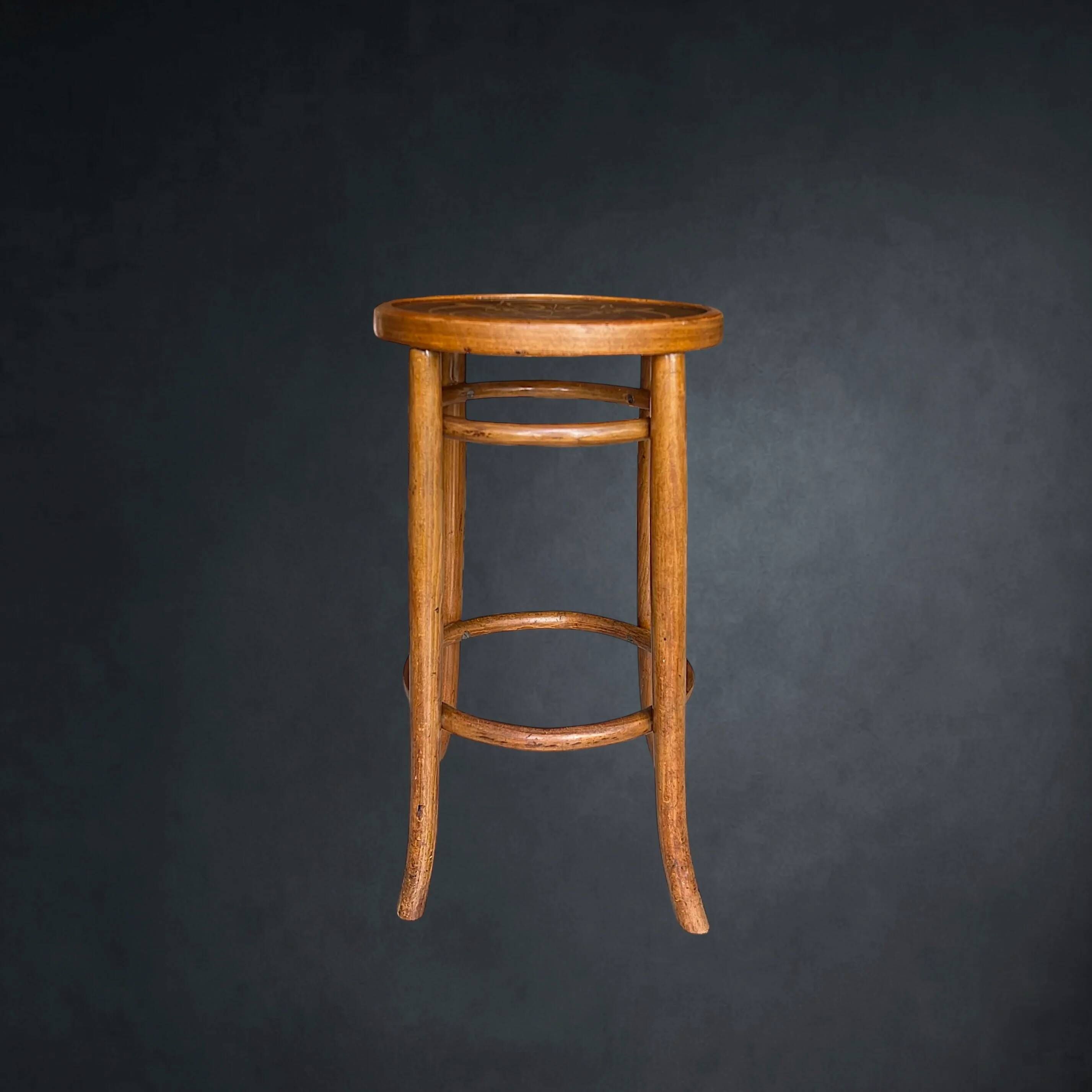 Antique high bistro stool in curved wood with a floral decorated top, Thonet style – around 1900