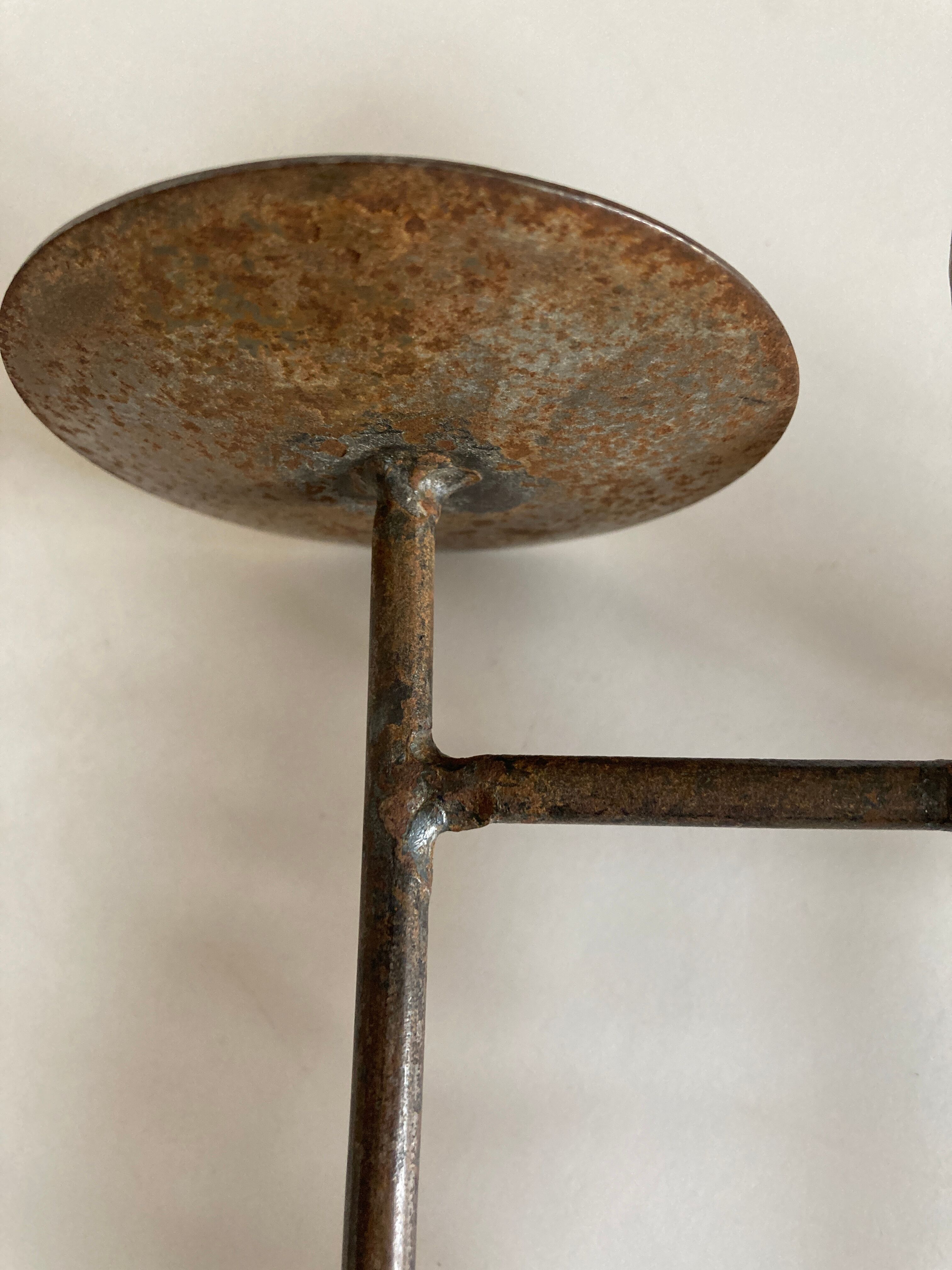 Raw beaten iron candlestick 1970