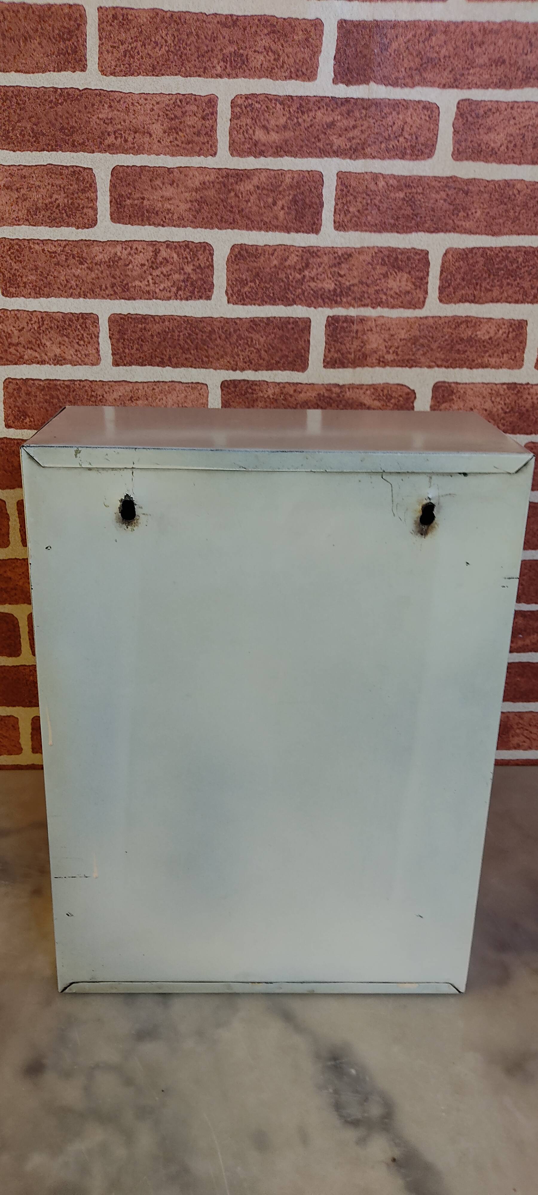 Sheet metal bathroom cabinet with mirror