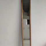Long wooden mirror and gilded stucco with pearl rays H: 2m45 L: 40cm
