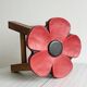 Small antique wooden stool with floral painted decoration.