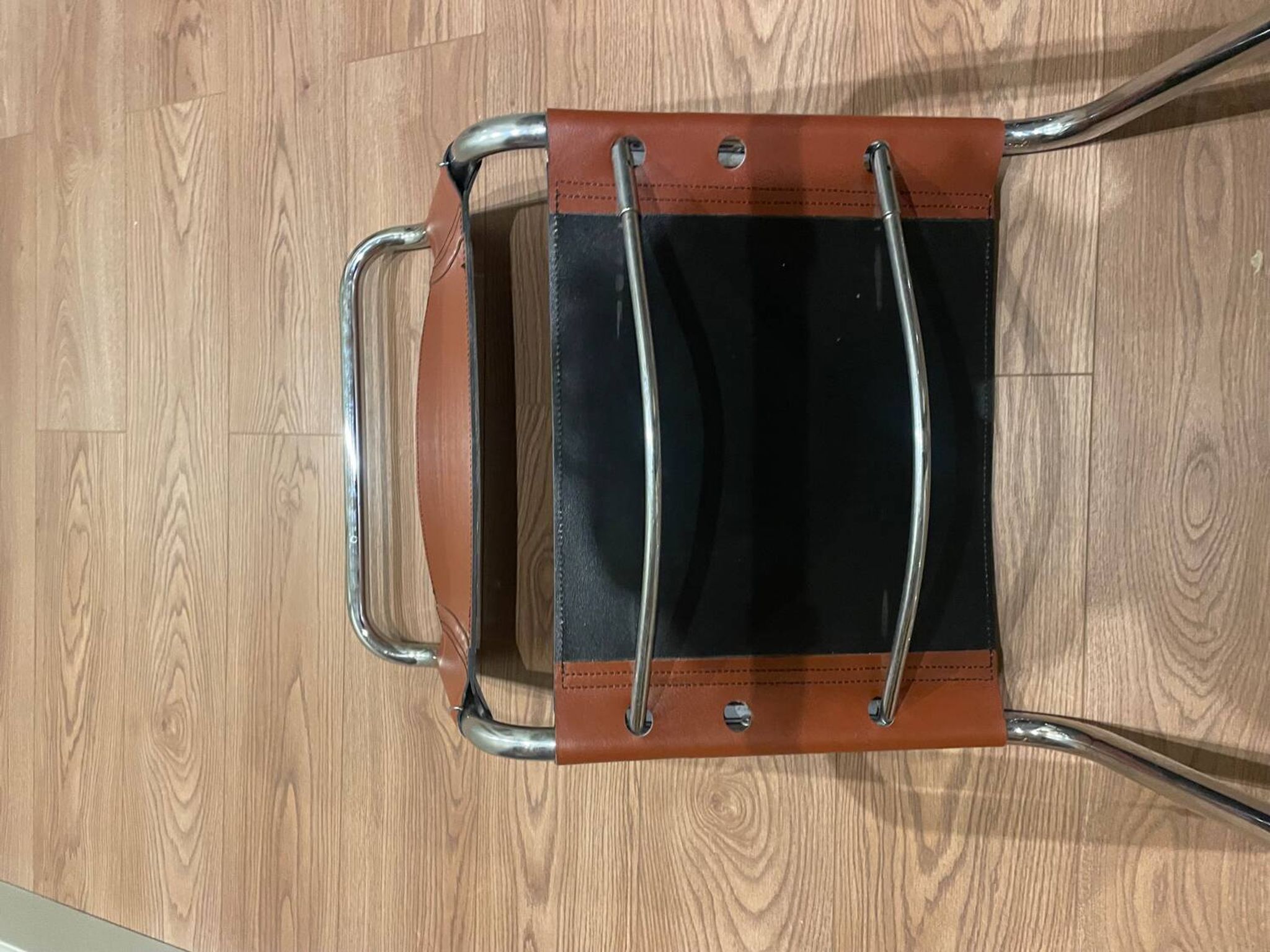 Hanging chair in Mart Stam S33 style in chrome metal and cognac imitation leather