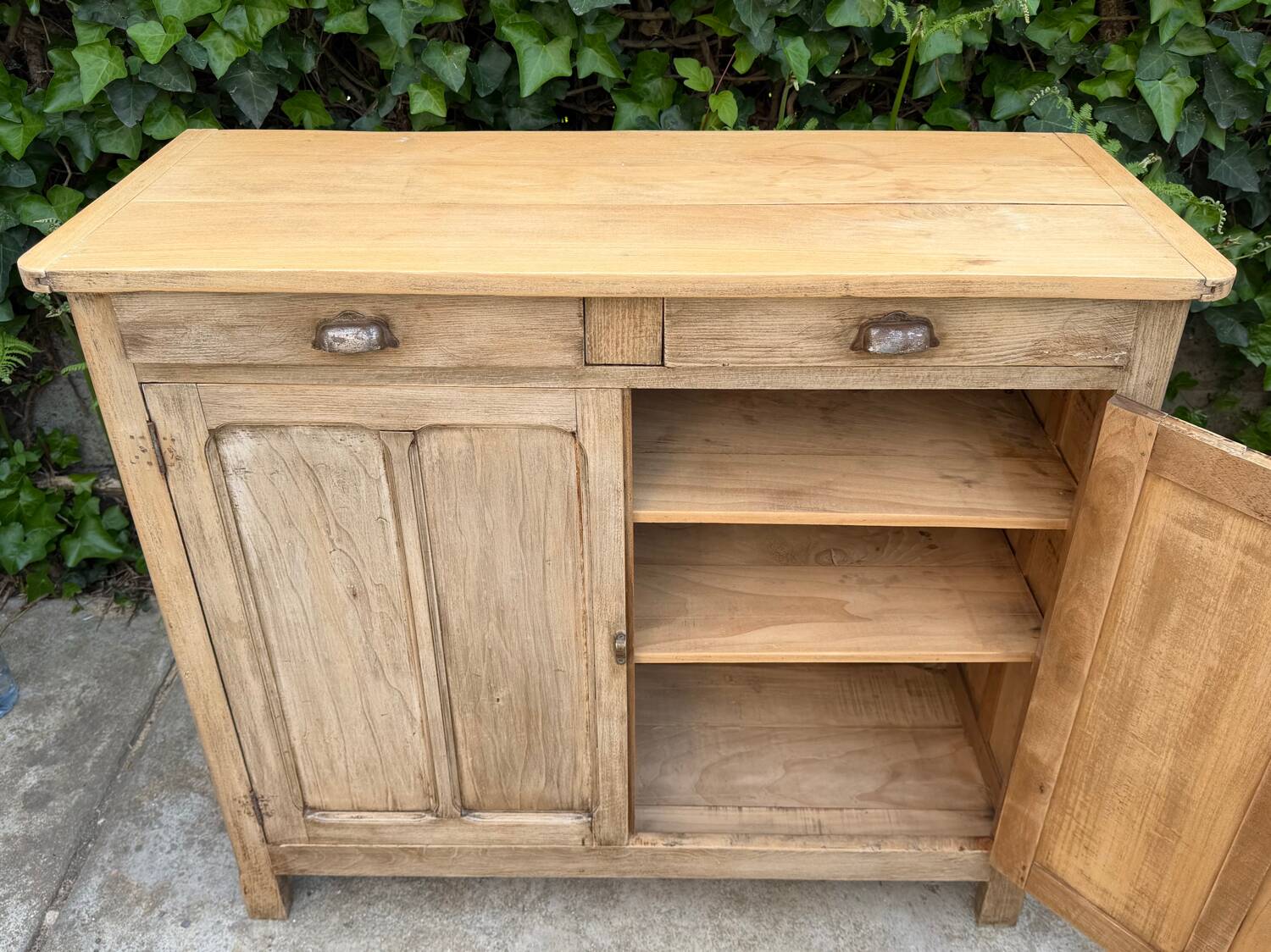 Antique patinated Parisian buffet with shell handles.