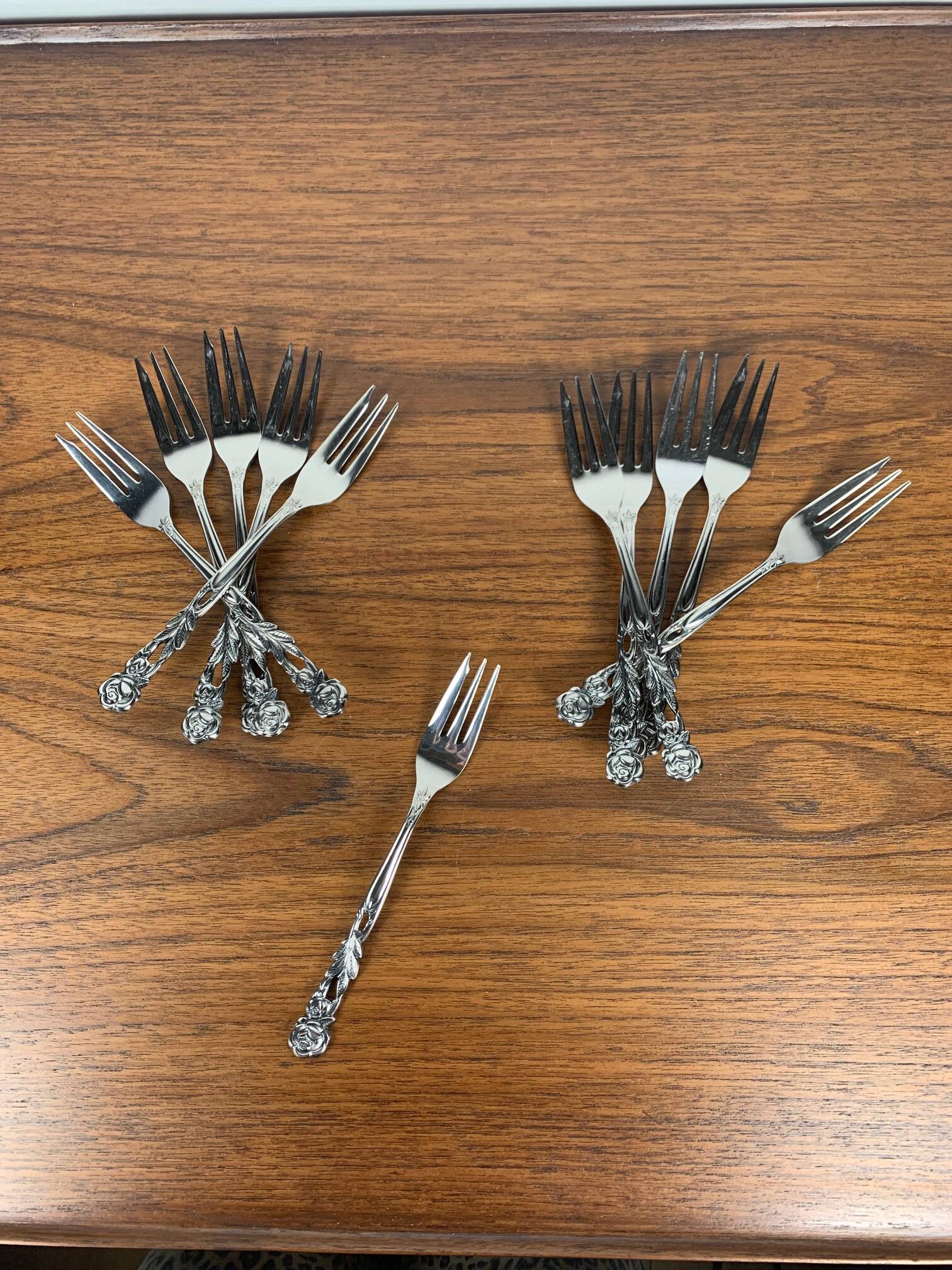Set of 10+1 Japanese stainless steel dessert forks, rose pattern, 1970