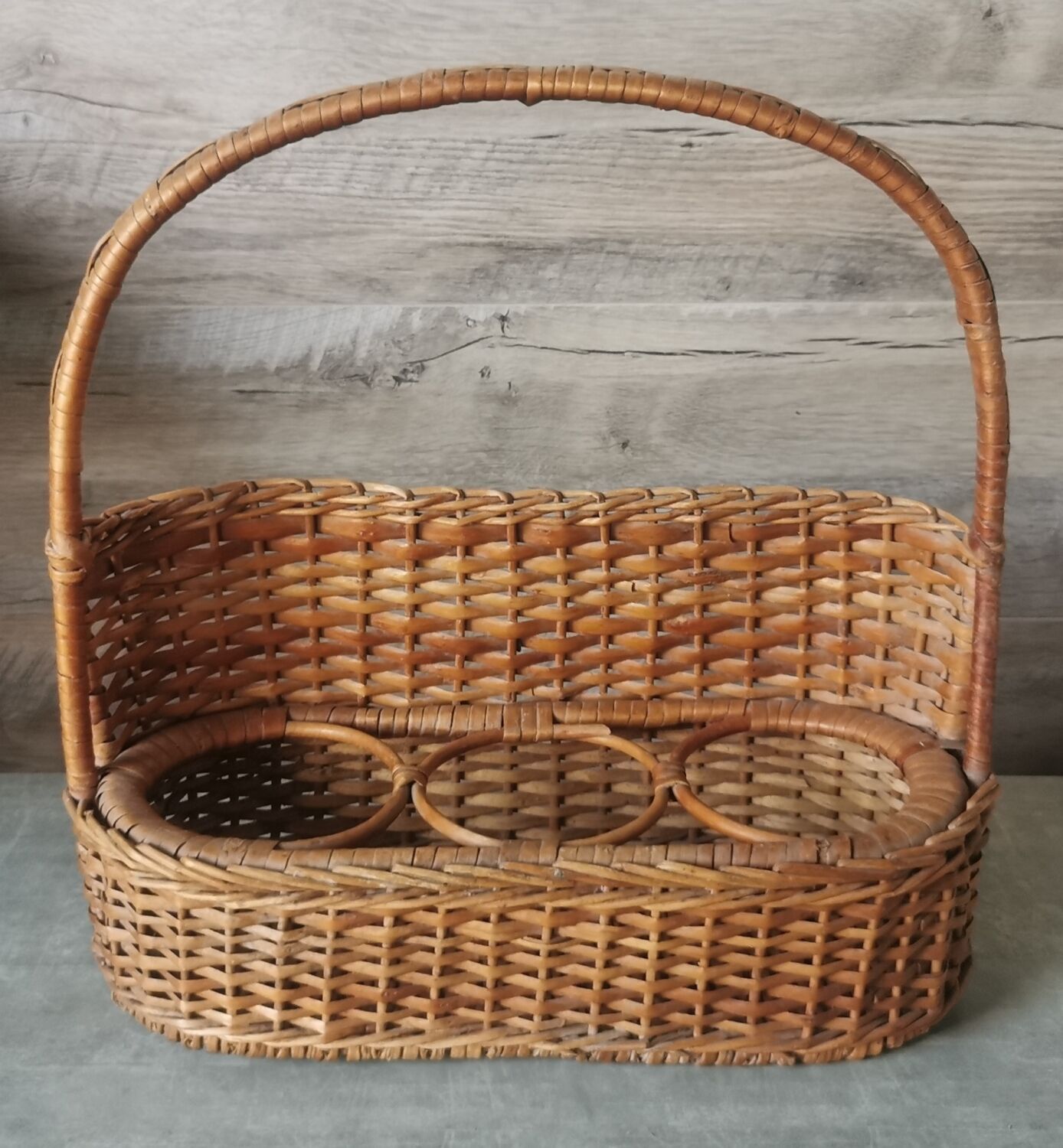 Vintage wicker bottle rack
