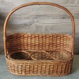 Vintage wicker bottle rack