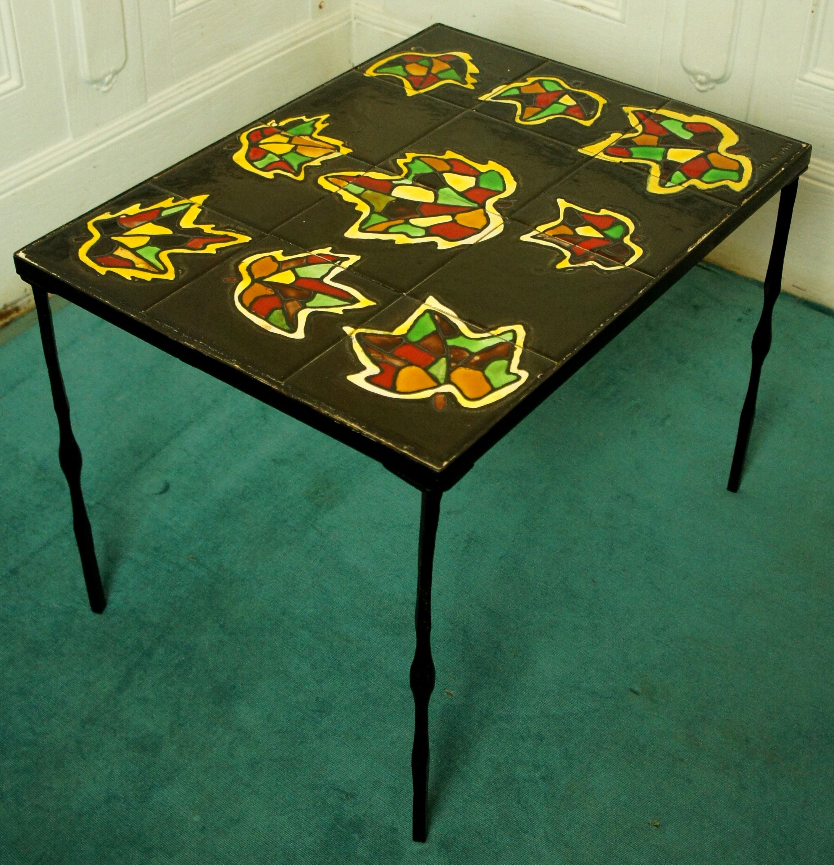 Signed black steel-ceramic side table