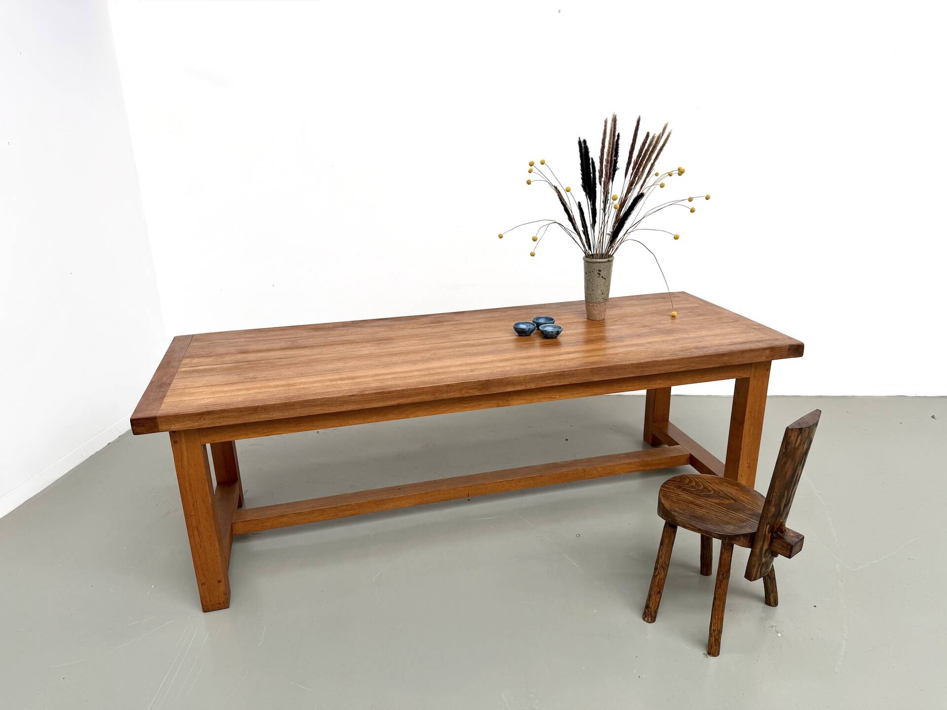 Large modernist farmhouse table in solid beech, thick dowelled top.