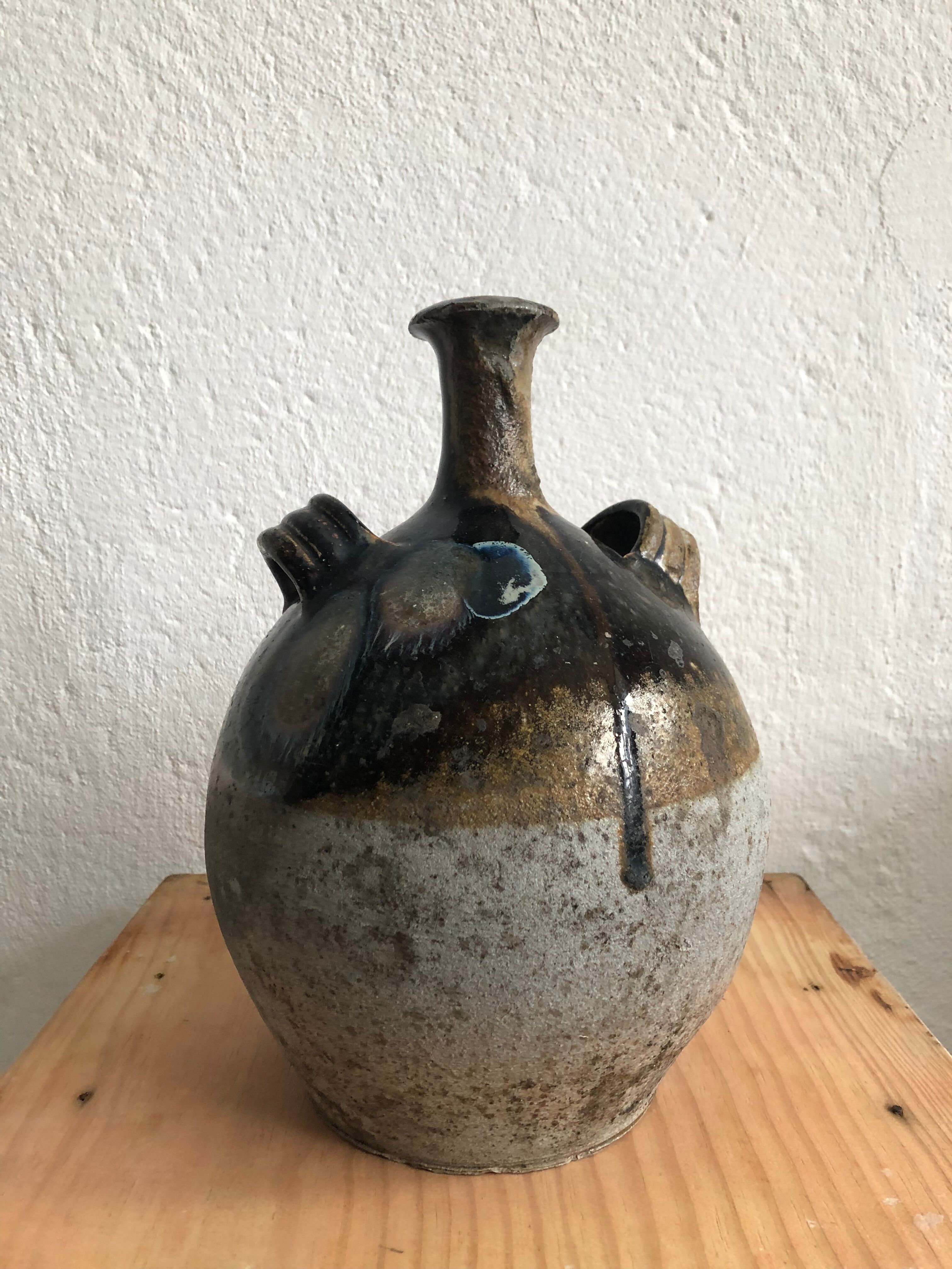 Old glazed terracotta jar