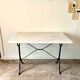 Bistro table in grey marble and cast iron