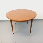 Round dining table in vintage Scandinavian style from the 50s and 60s in teak.