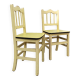 Pair of wooden and yellow formica chairs
