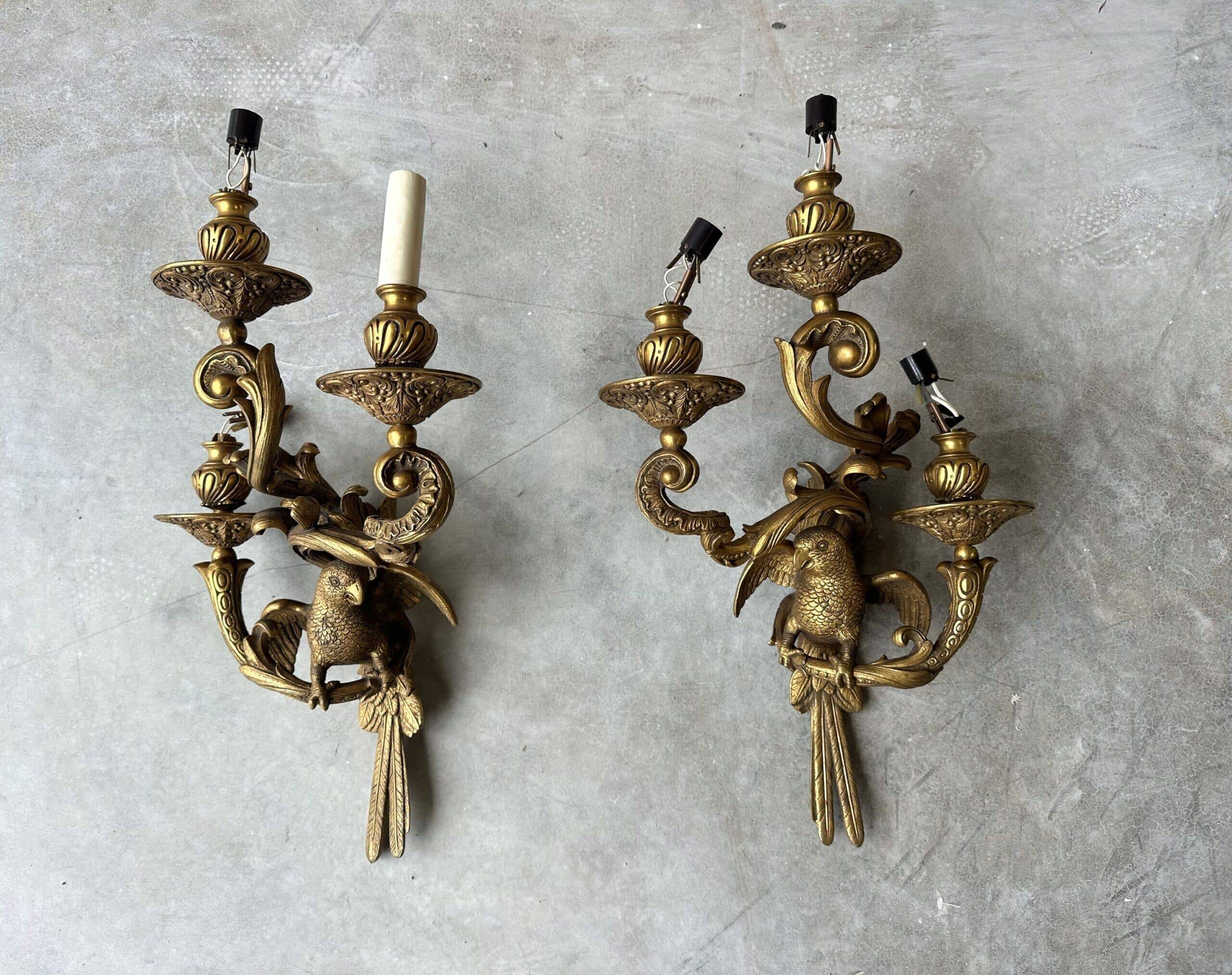 Pair of bronze wall sconces with parrots, early 20th century.