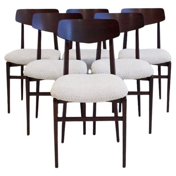 Set of six mid-century Italian wooden dining chairs.