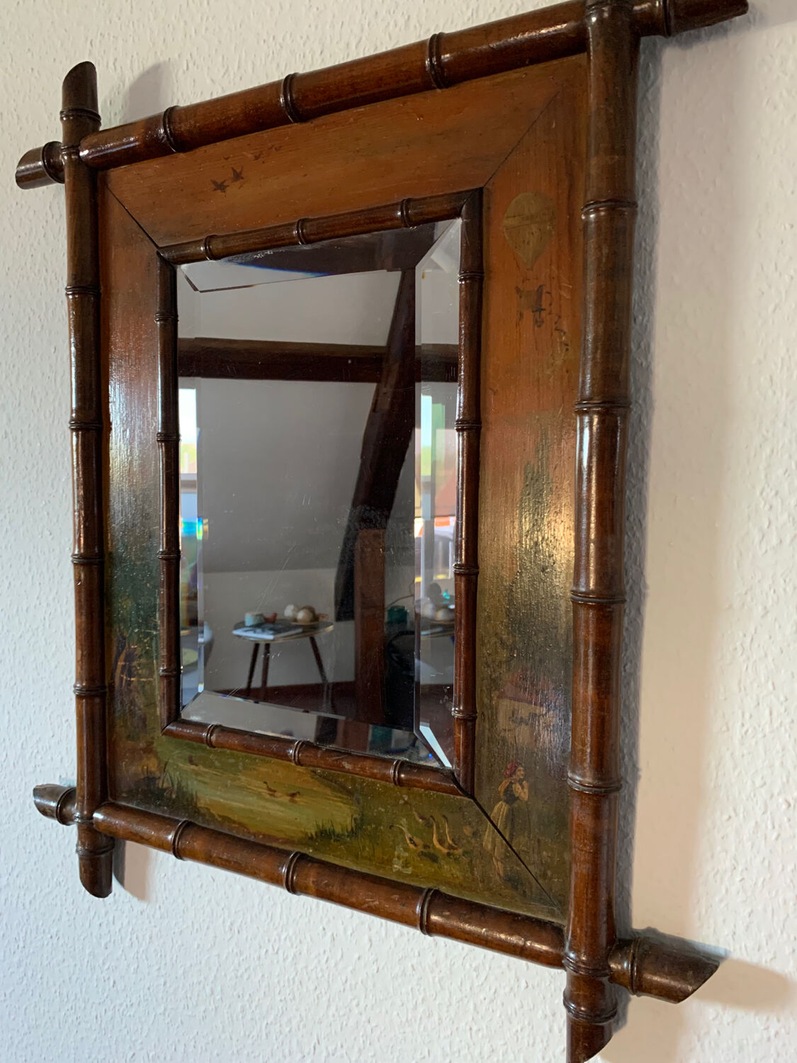 Bamboo wood mirror and 19th-century paintings