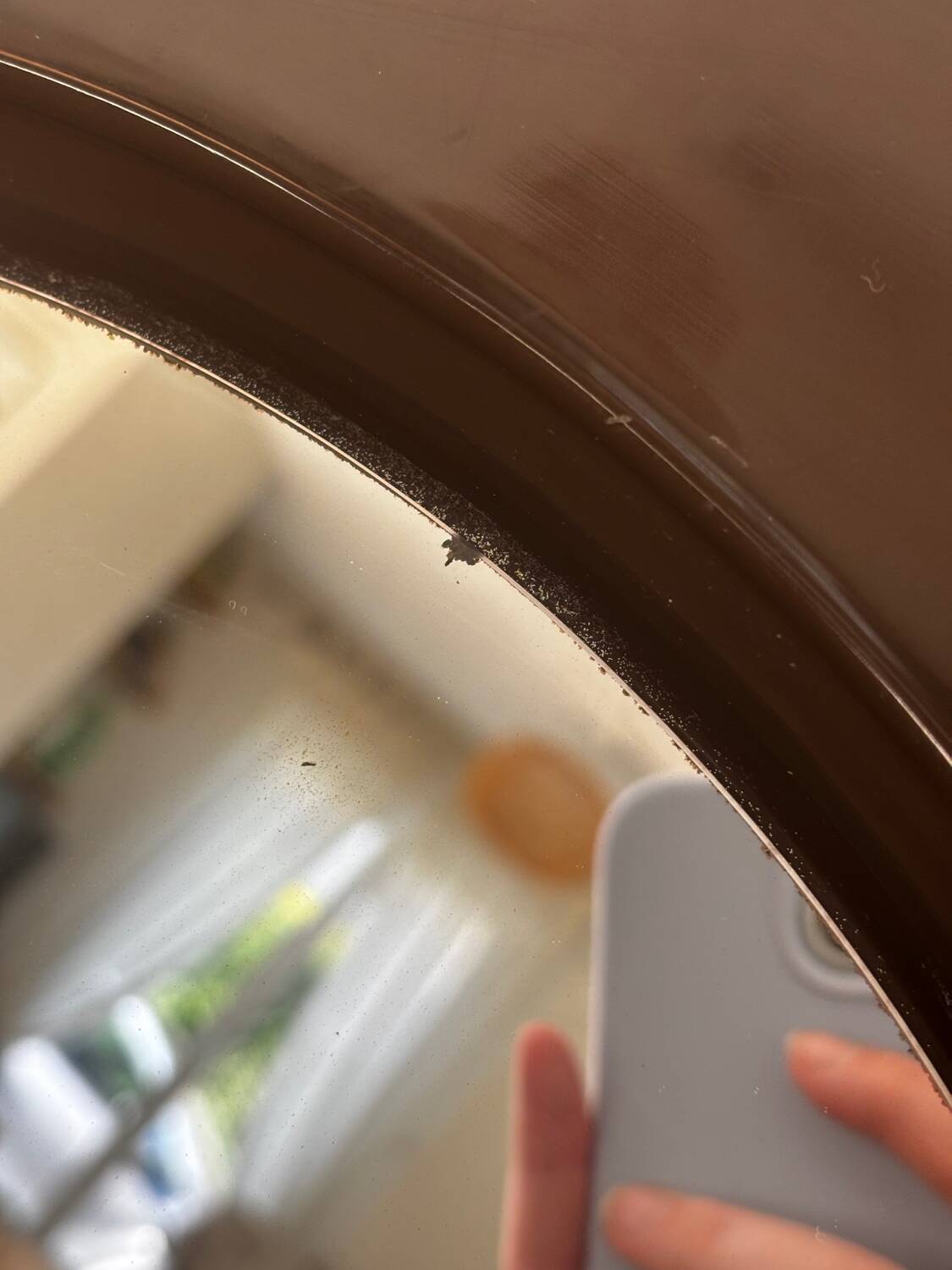 Vintage round mirror from the 70s, smoked brown plastic