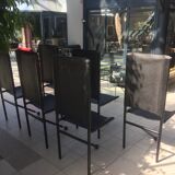 Set of 6 dining room chairs with tripod legs in grained leather and metal 1970