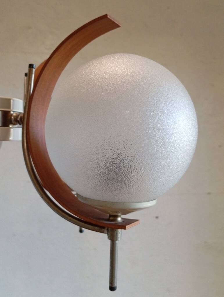 Scandinavian suspension in teak, glass, and metal.