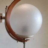 Scandinavian suspension in teak, glass, and metal.