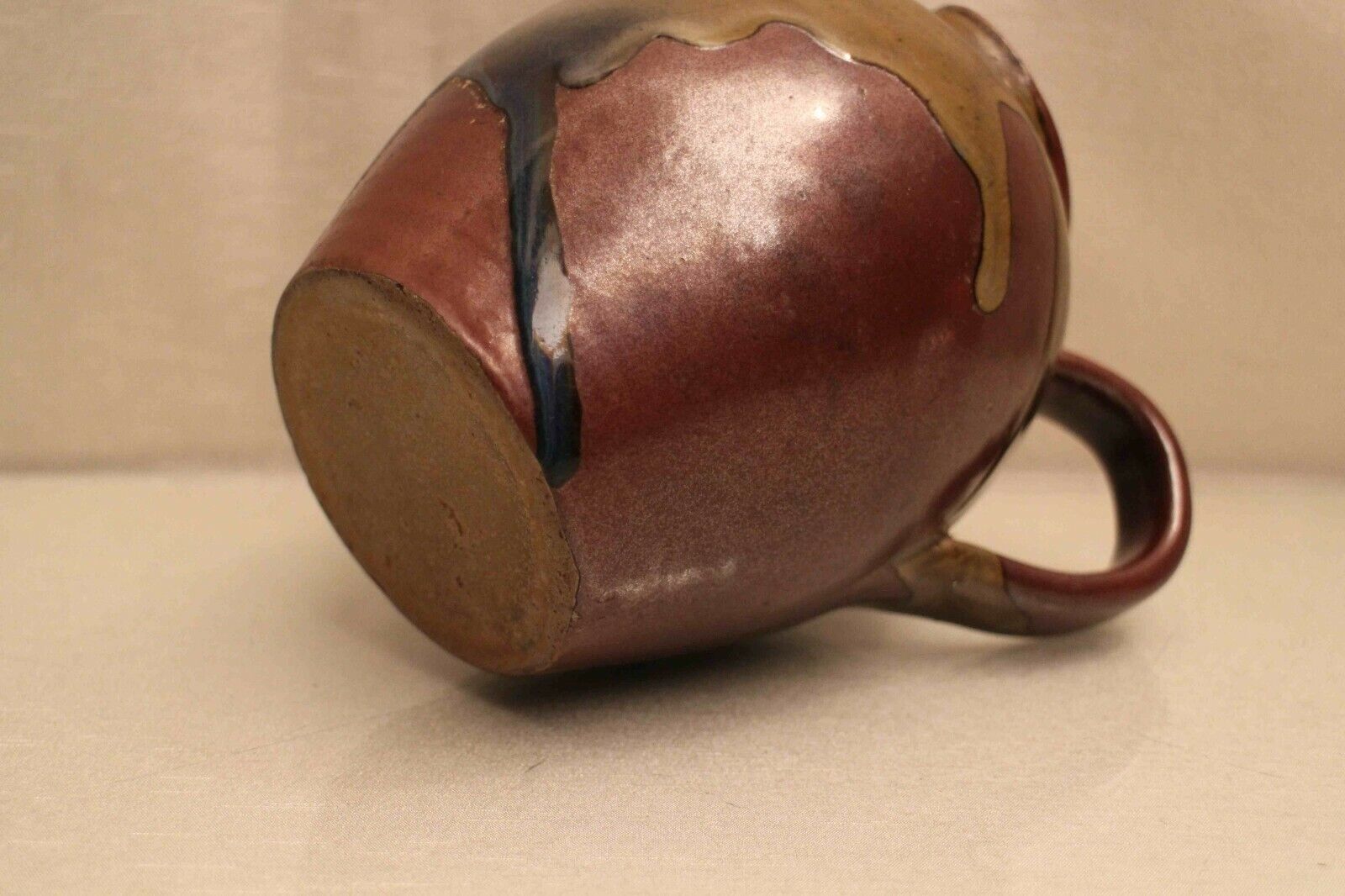 Pitcher in glazed sandstone