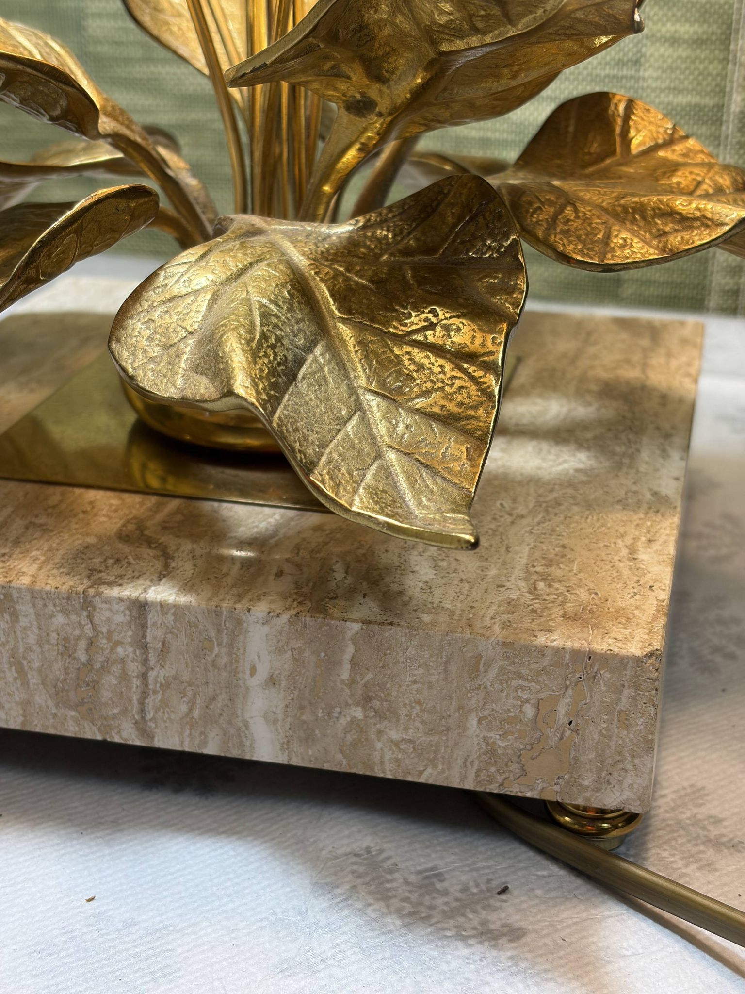 Bronze and travertine water lily lamp attributed to Maison Charles, circa 1970.