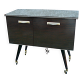 Vintage 1960s rolling and illuminating bar with compass legs.