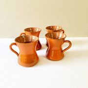 4 large orange enameled ceramic cups, signed
