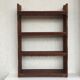 Large shelf wall in wood with friezes