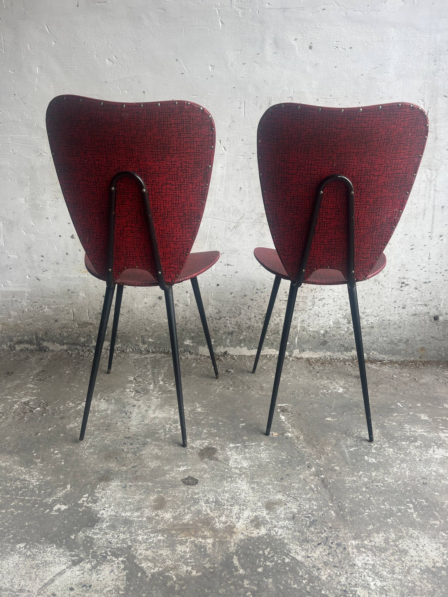 Pair of Mid-Century Red Vinyl Dining Chairs with Black Metal Legs, Sculptural Curved Backs