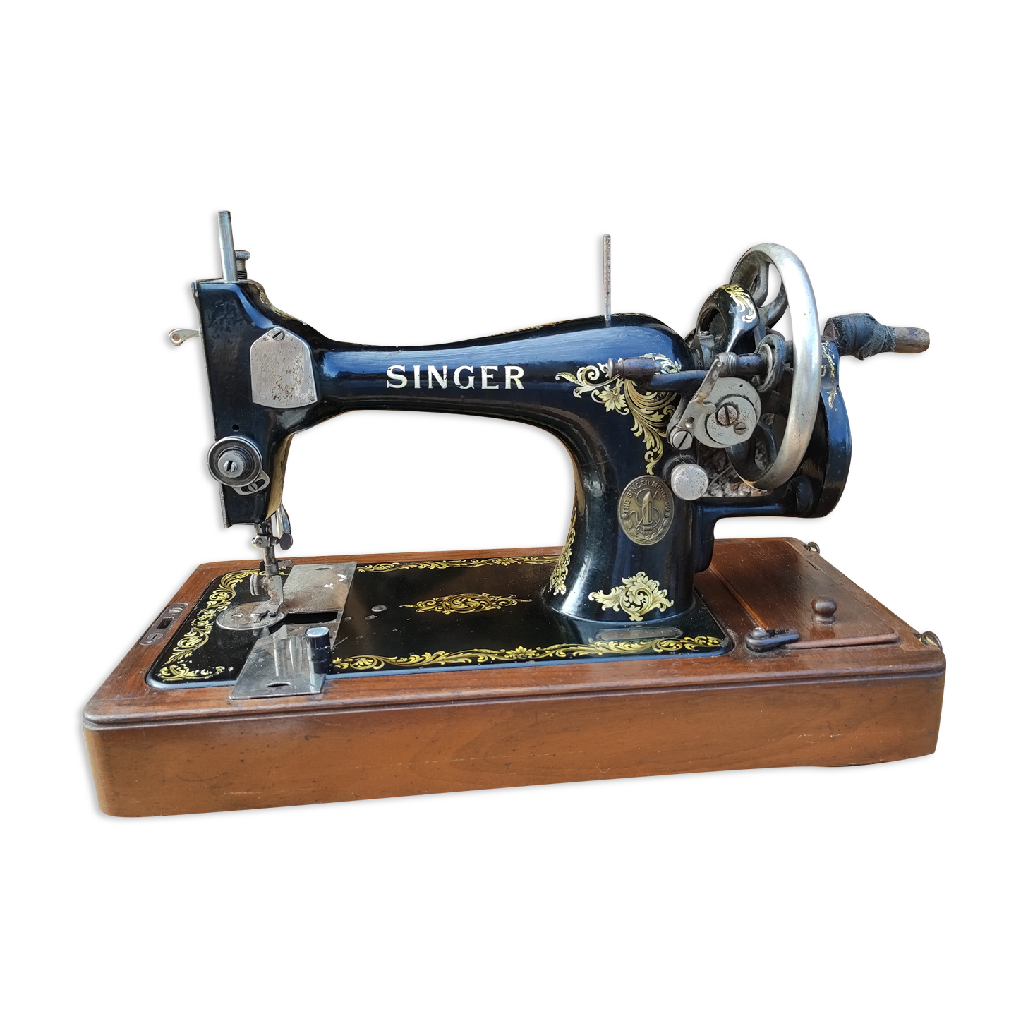 Old Singer sewing machine on its original base