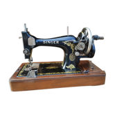 Old Singer sewing machine on its original base