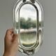 Vintage silver plateau with knot handles.