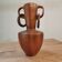 wooden vase carved in the mass