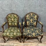 Pair of Louis XV period cabriolet armchairs in carved wood, 18th century