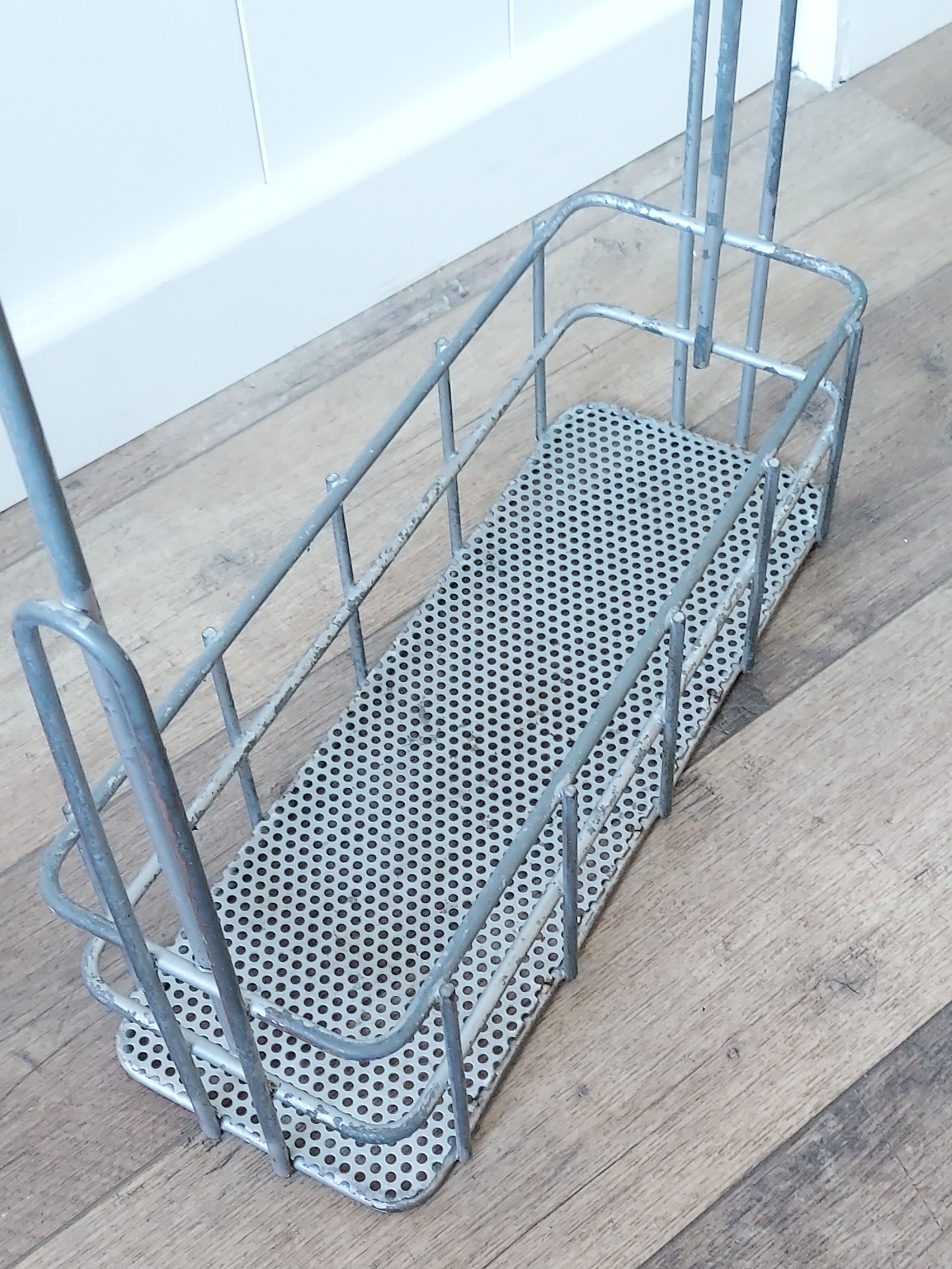 Antique perforated metal pool jack