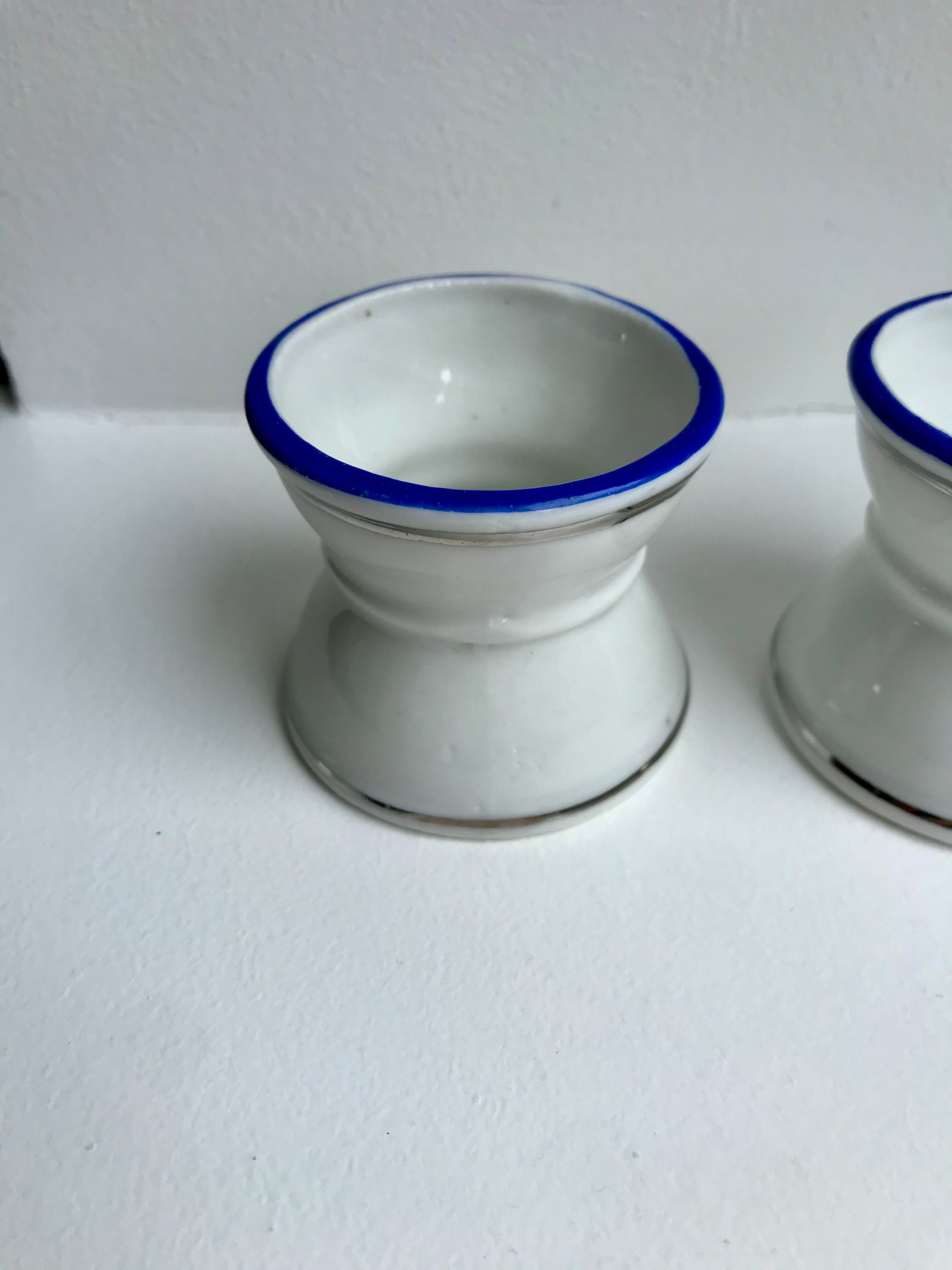 Trio of shells diabolo white edging silver and bright blue 50s