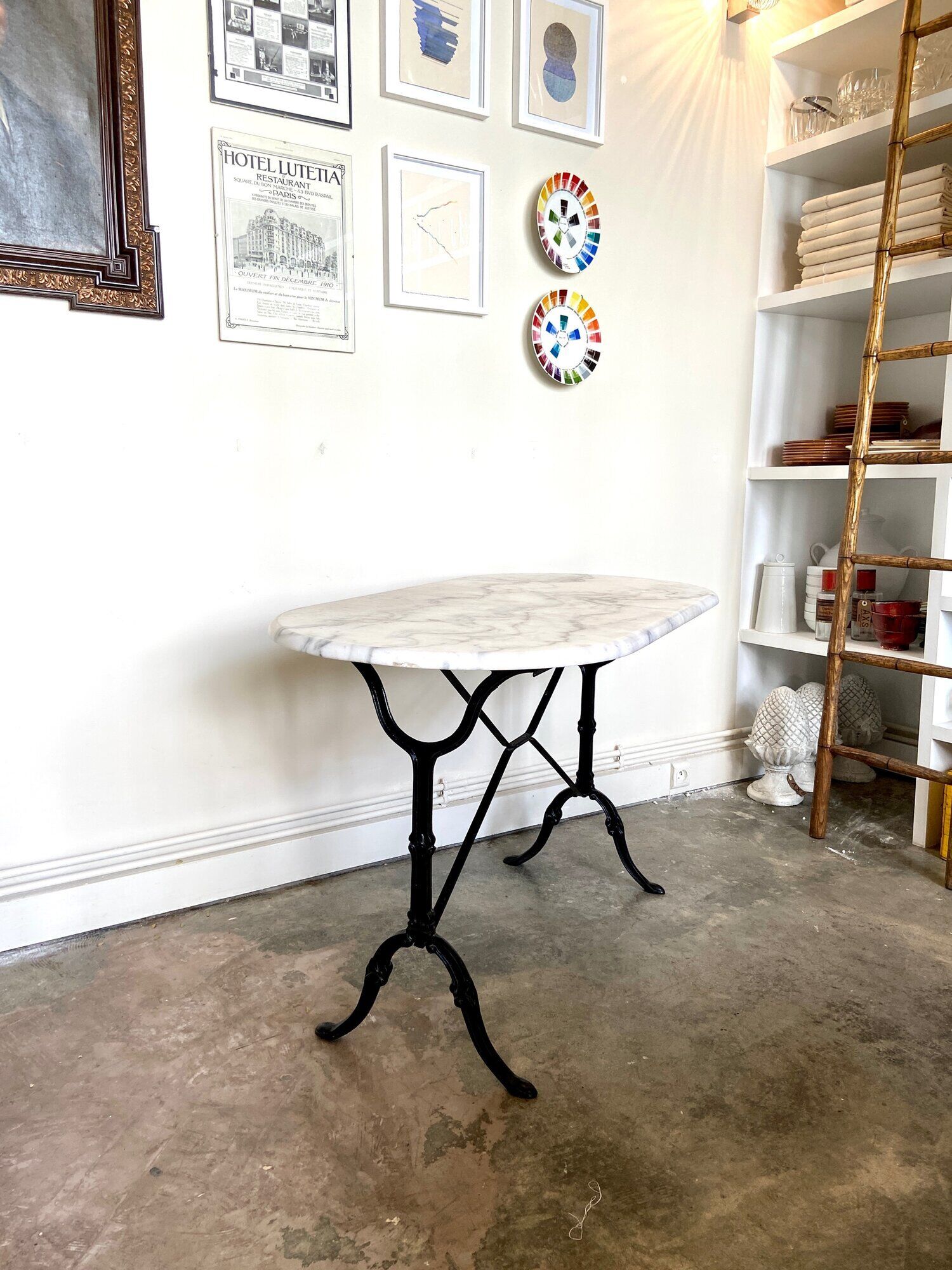 Bistro table in gray marble and cast iron
