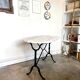 Bistro table in gray marble and cast iron