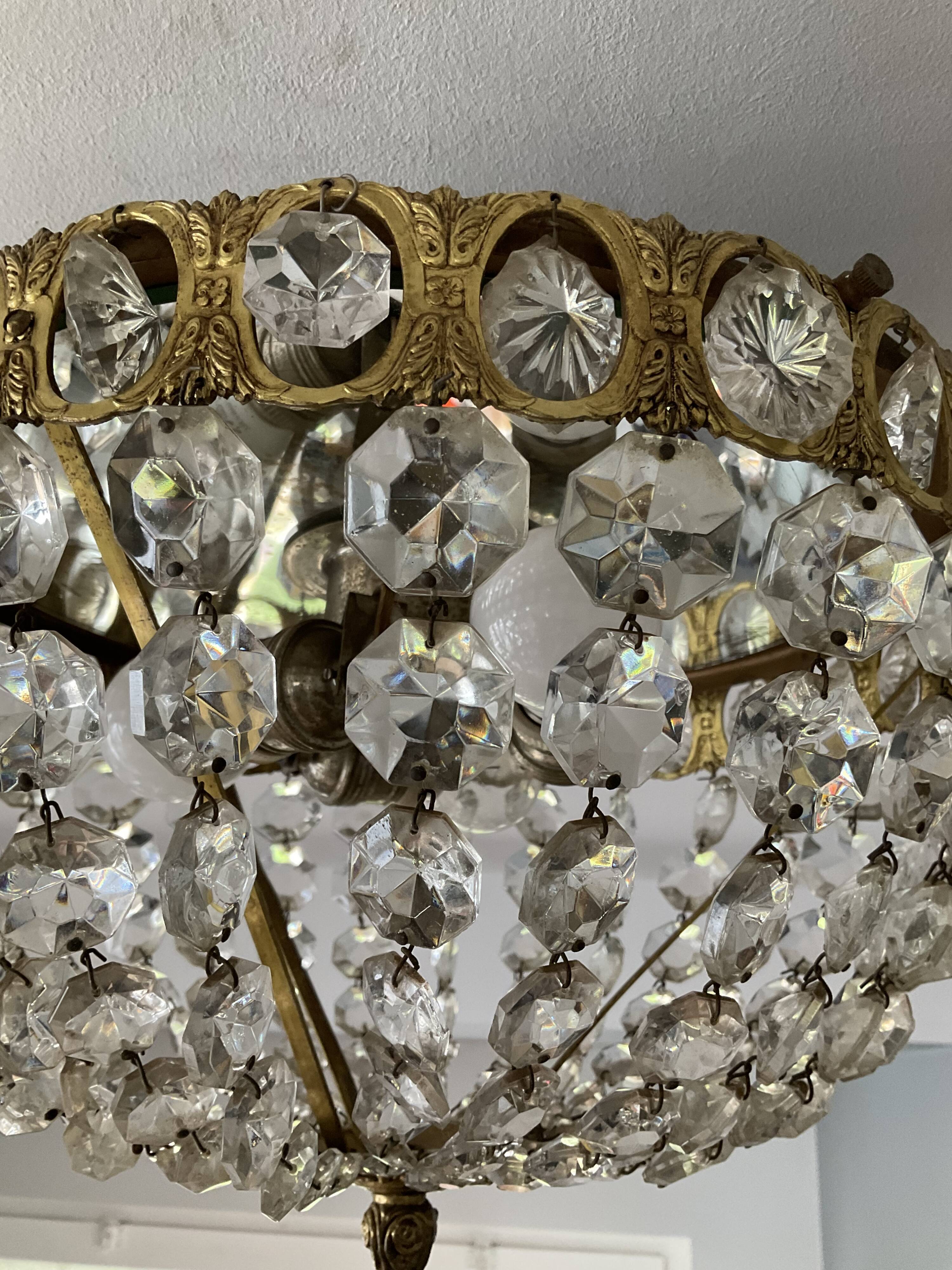 Old ceiling lamp basket in bronze and grapevines