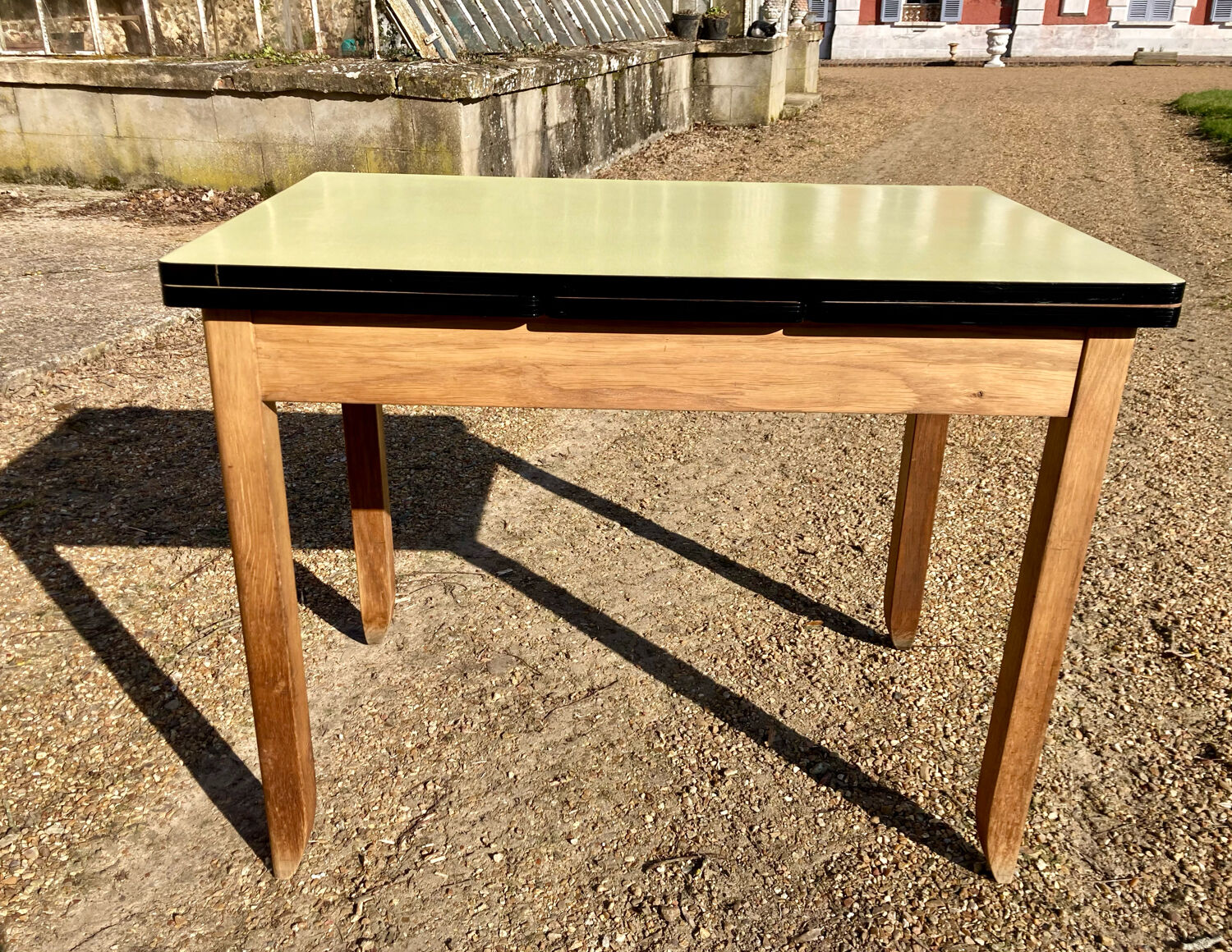 Expandable yellow formica table