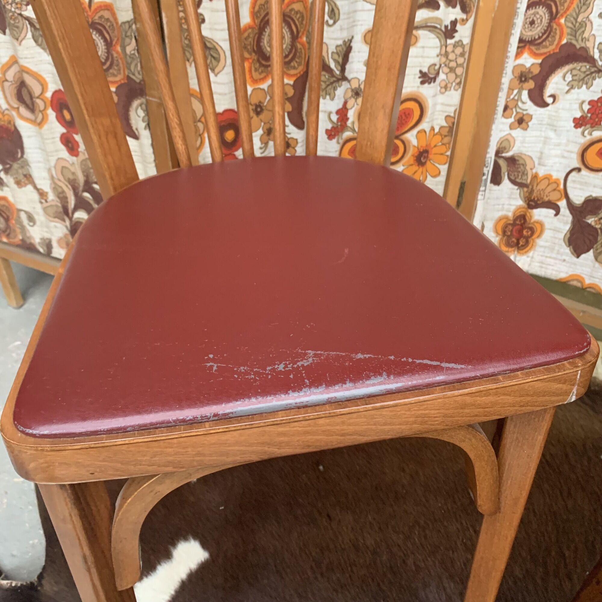2 baumann bistro chairs sitting skai 1 red and 1 burgundy
