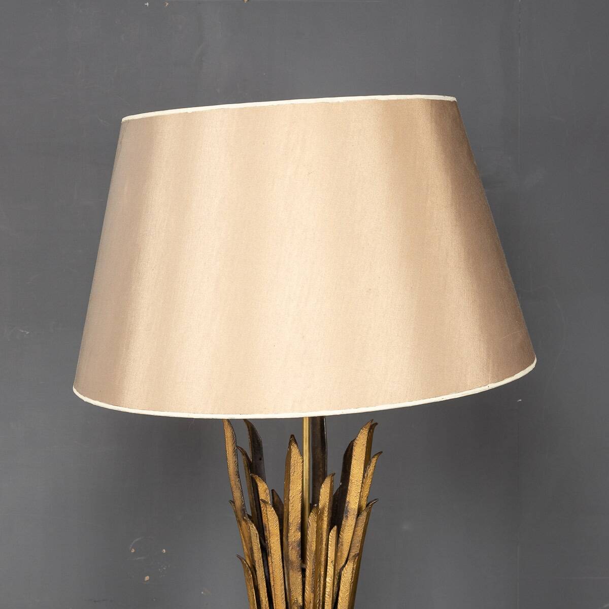 A french gilt wrought iron floor lamp, attributed to maison bagues c.1970