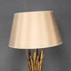 A french gilt wrought iron floor lamp, attributed to maison bagues c.1970