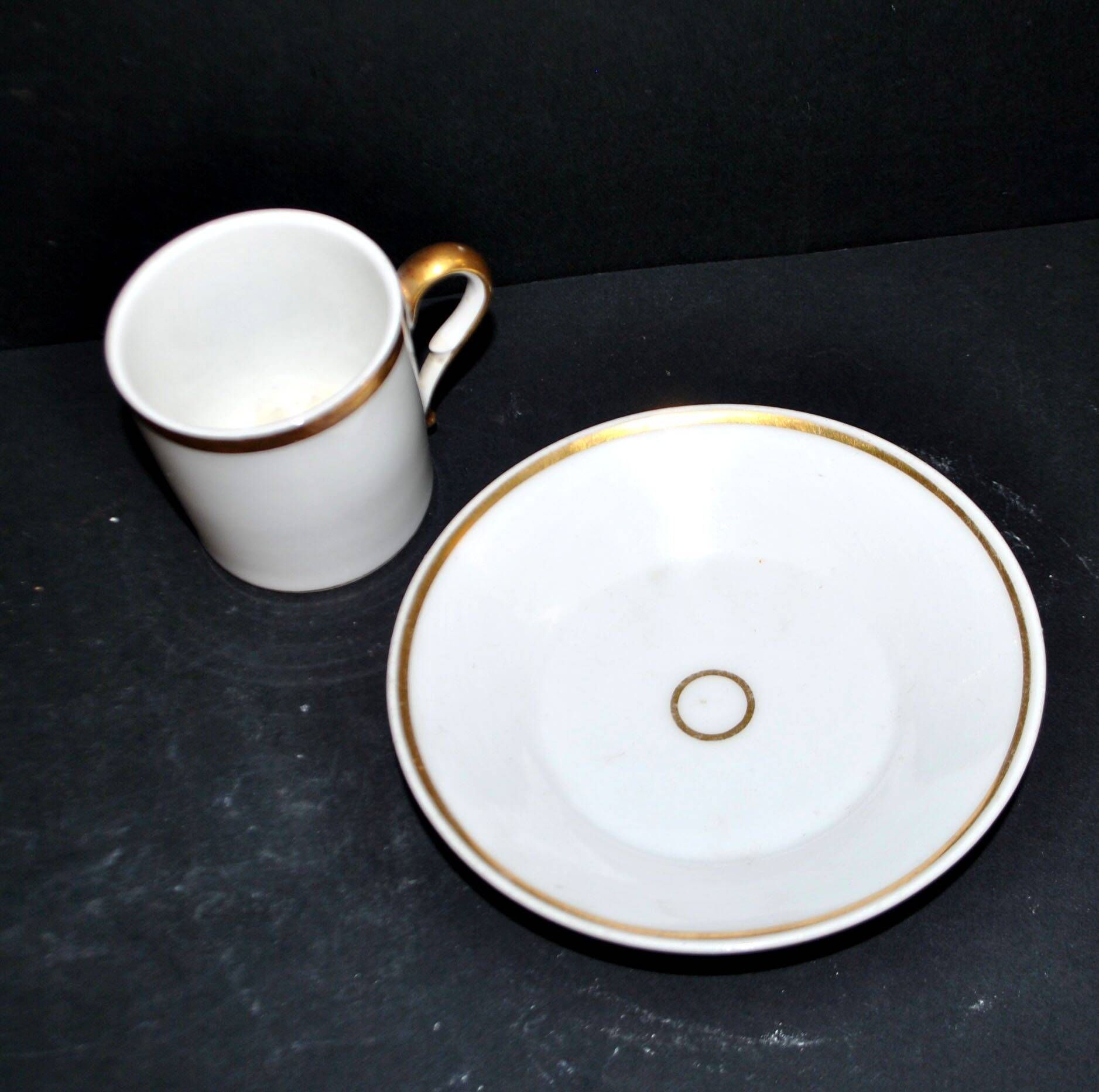 Charles Hebert Rouen porcelain – Antique litron coffee cup with gold trim.