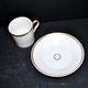 Charles Hebert Rouen porcelain – Antique litron coffee cup with gold trim.