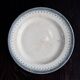 Round vintage patinated ironstone serving dish - Border model